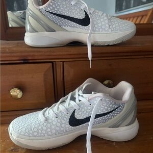 Nike White and Gray Athletic Shoes with Black Logo